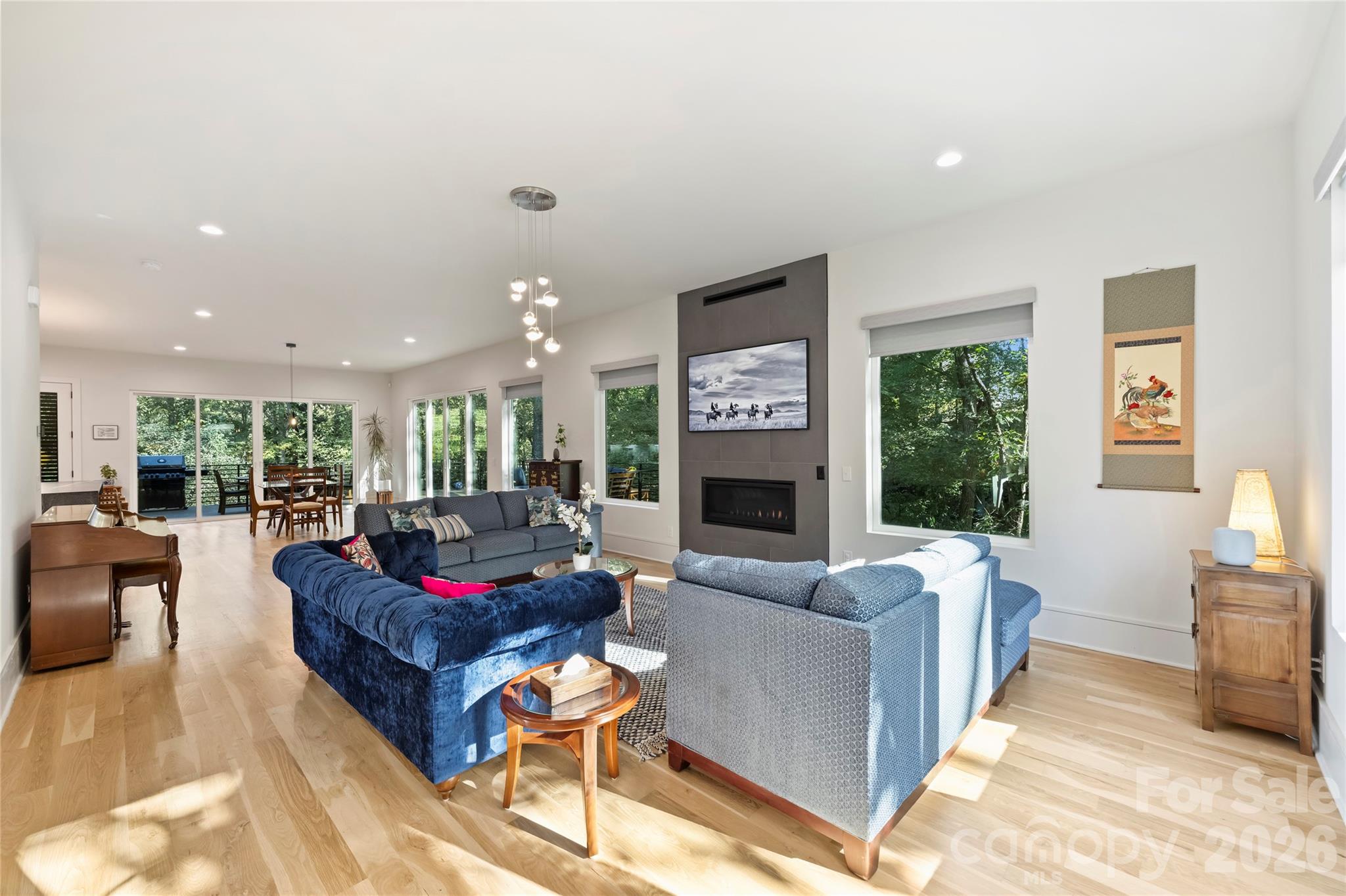 7223 Terrace Drive Charlotte, NC 28211 - Photo 7 of 48 a living room with furniture fireplace and a large window
