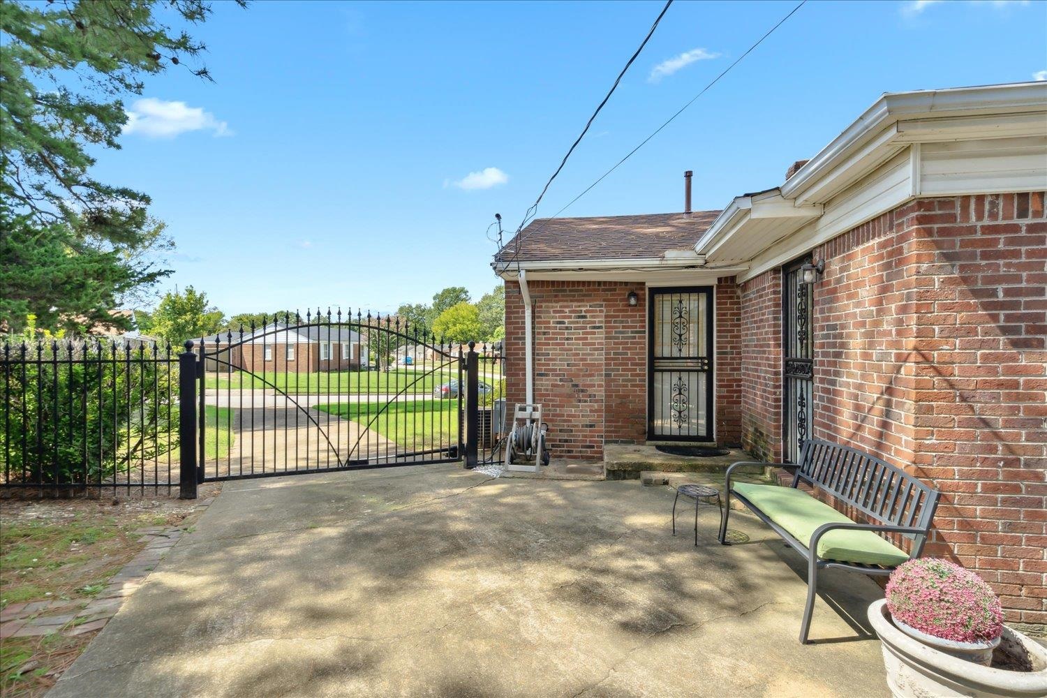 3274 Norton Road Memphis, TN 38109 - Photo 19 of 26 a view of a house with backyard and porch