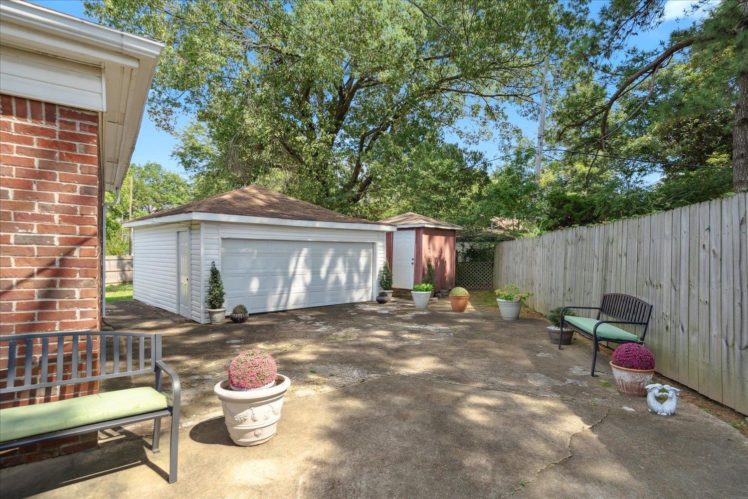 3274 Norton Road Memphis, TN 38109 - Photo 20 of 26 a view of a chair and table in backyard of the house