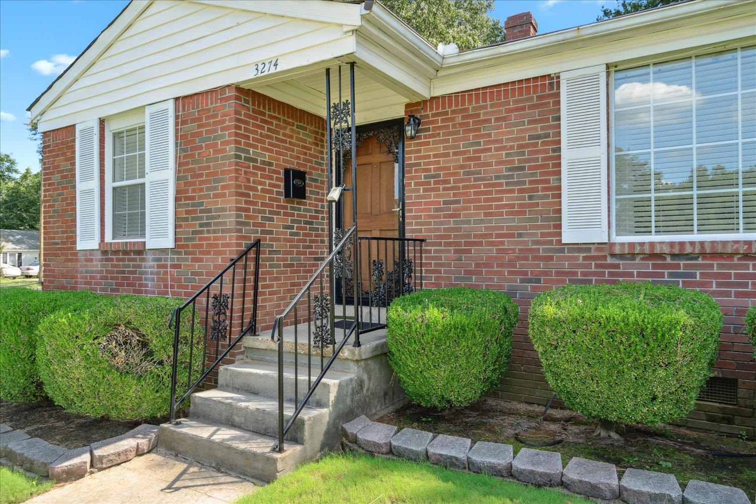 3274 Norton Road Memphis, TN 38109 - Photo 3 of 26 a view of a backyard with a garden