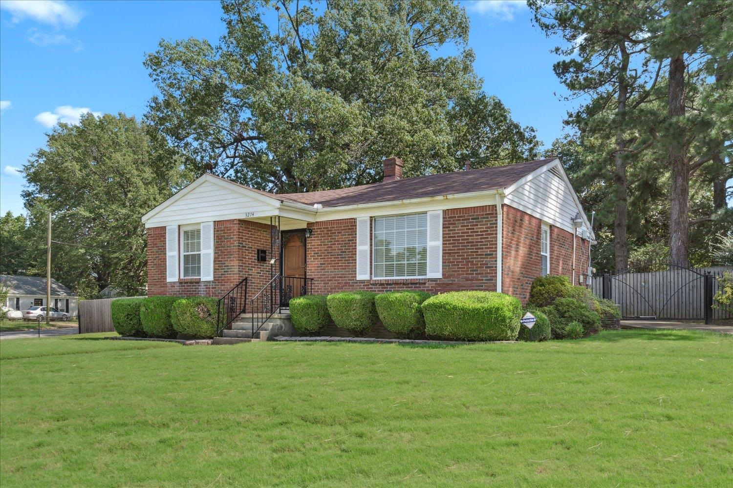 3274 Norton Road Memphis, TN 38109 - Photo 4 of 26 a view of a house with a yard and plants