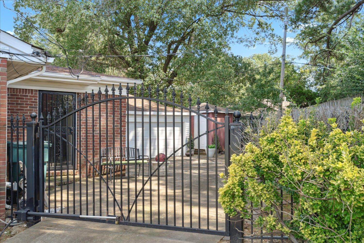 3274 Norton Road Memphis, TN 38109 - Photo 5 of 26 a view of a black gate