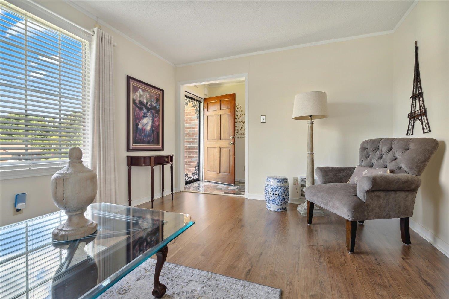 3274 Norton Road Memphis, TN 38109 - Photo 6 of 26 a living room with furniture and a wooden floor