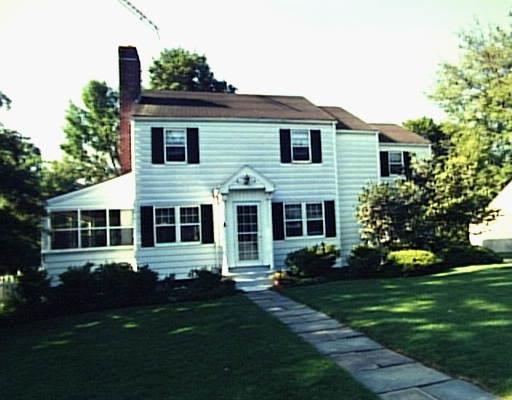 37 Norman Road Stamford, CT 06906 - Photo 1 of 1 a front view of a house with a garden and plants