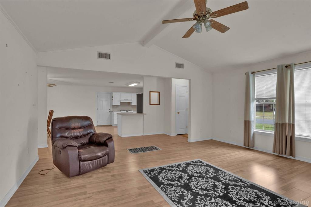 101 West Jefferson Street Haughton, LA 71037 - Photo 12 of 39 a living room with furniture and a rug
