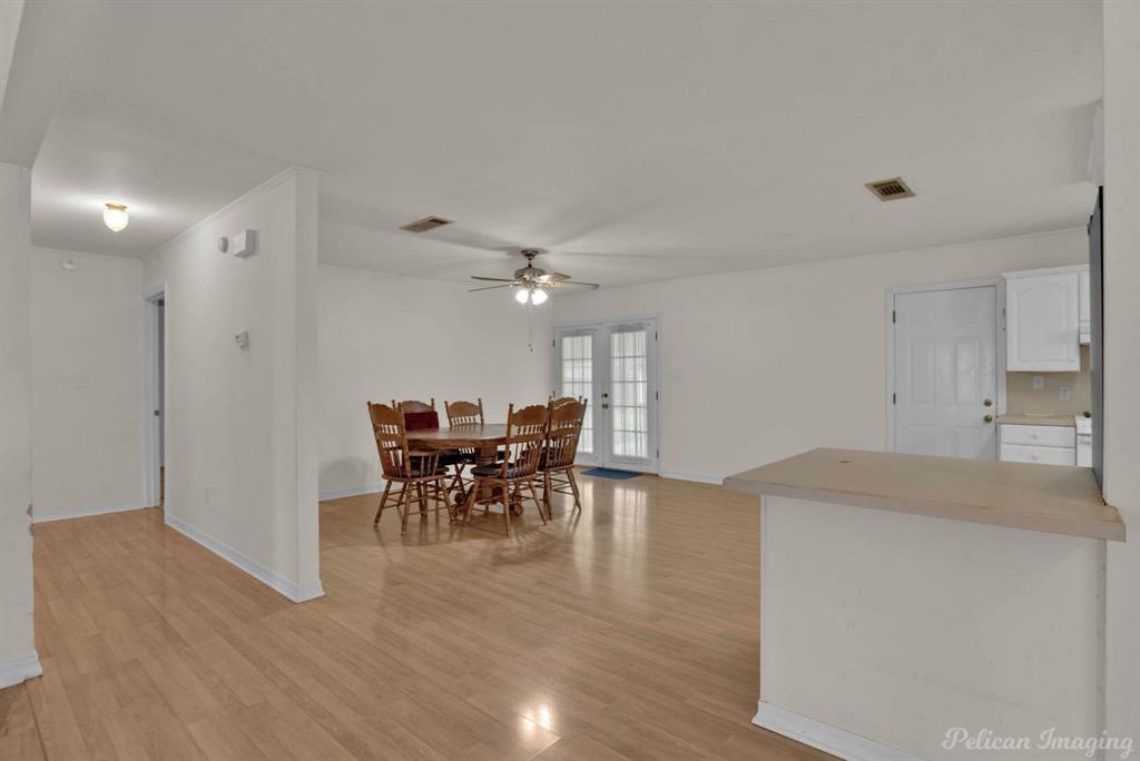 101 West Jefferson Street Haughton, LA 71037 - Photo 13 of 39 a view of a dining room with furniture and a chandelier