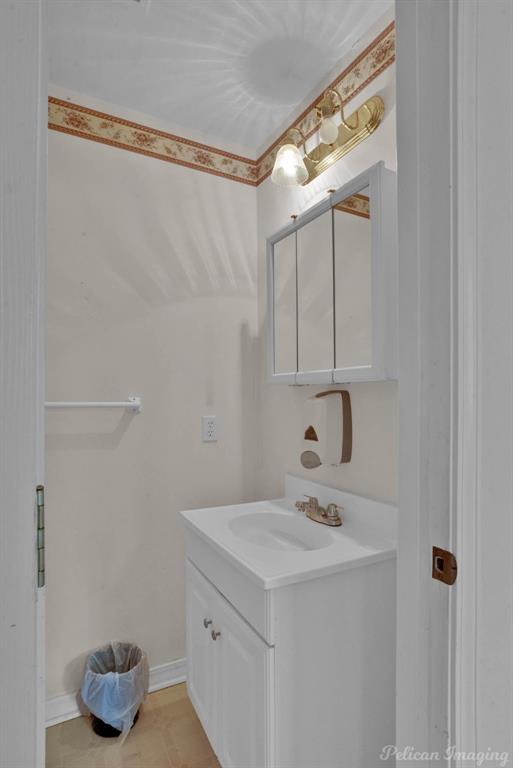 101 West Jefferson Street Haughton, LA 71037 - Photo 22 of 39 a bathroom with a sink and a mirror