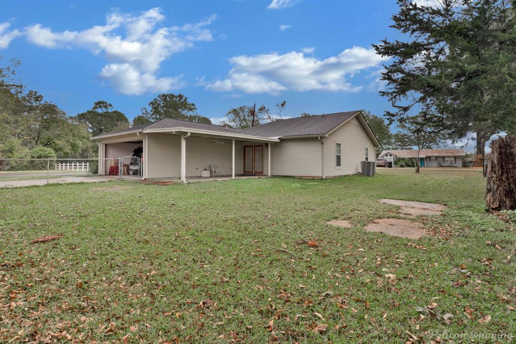 101 West Jefferson Street Haughton, LA 71037 - Photo 30 of 39 a view of a house with a yard