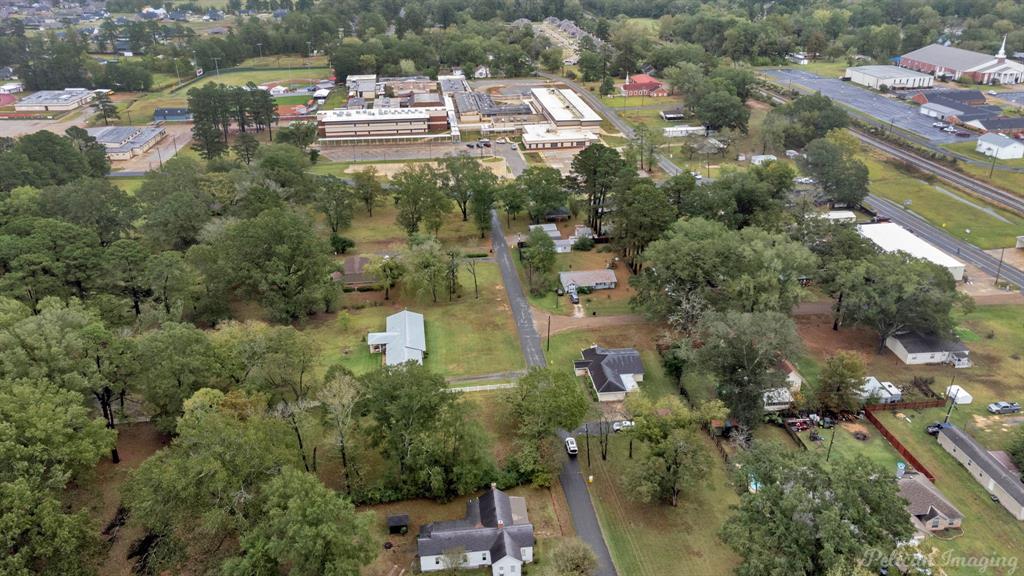 101 West Jefferson Street Haughton, LA 71037 - Photo 35 of 39 an aerial view of residential houses with outdoor space and trees