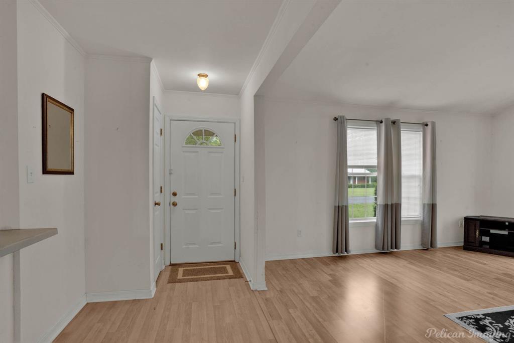101 West Jefferson Street Haughton, LA 71037 - Photo 6 of 39 a view of entryway with wooden floor