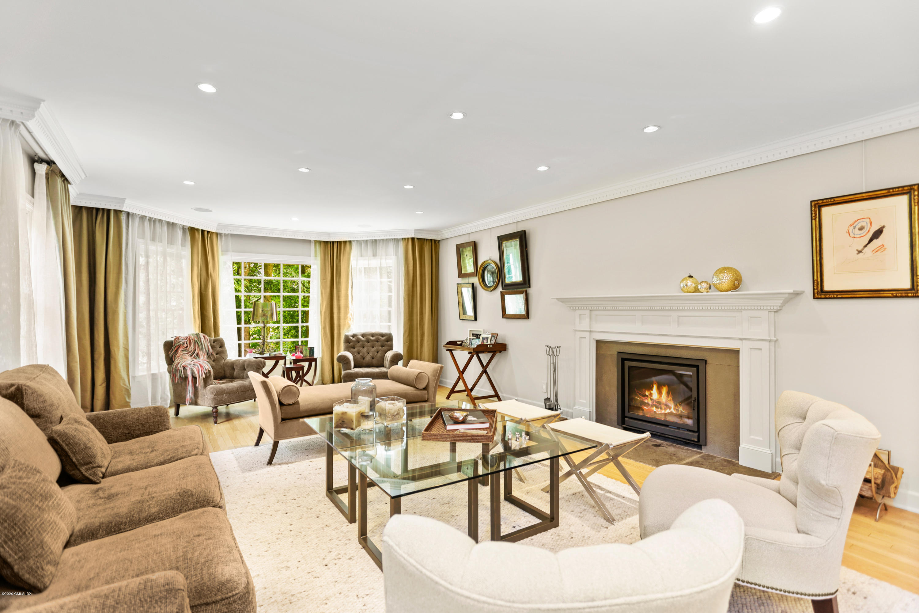 137 Clapboard Ridge Road Greenwich, CT 06831 - Photo 11 of 29 a living room with furniture and a fireplace