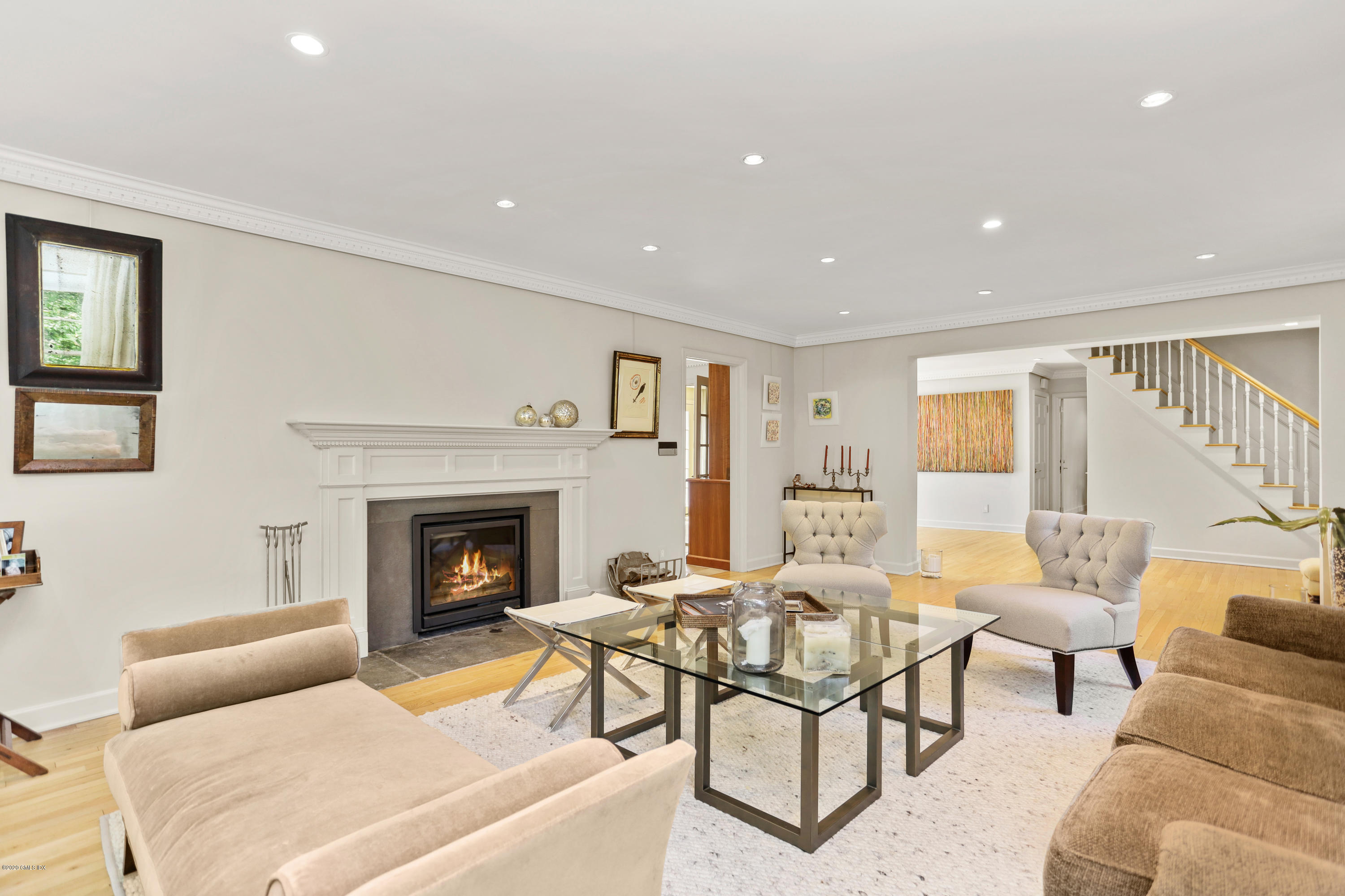 137 Clapboard Ridge Road Greenwich, CT 06831 - Photo 12 of 29 a living room with furniture and a fireplace