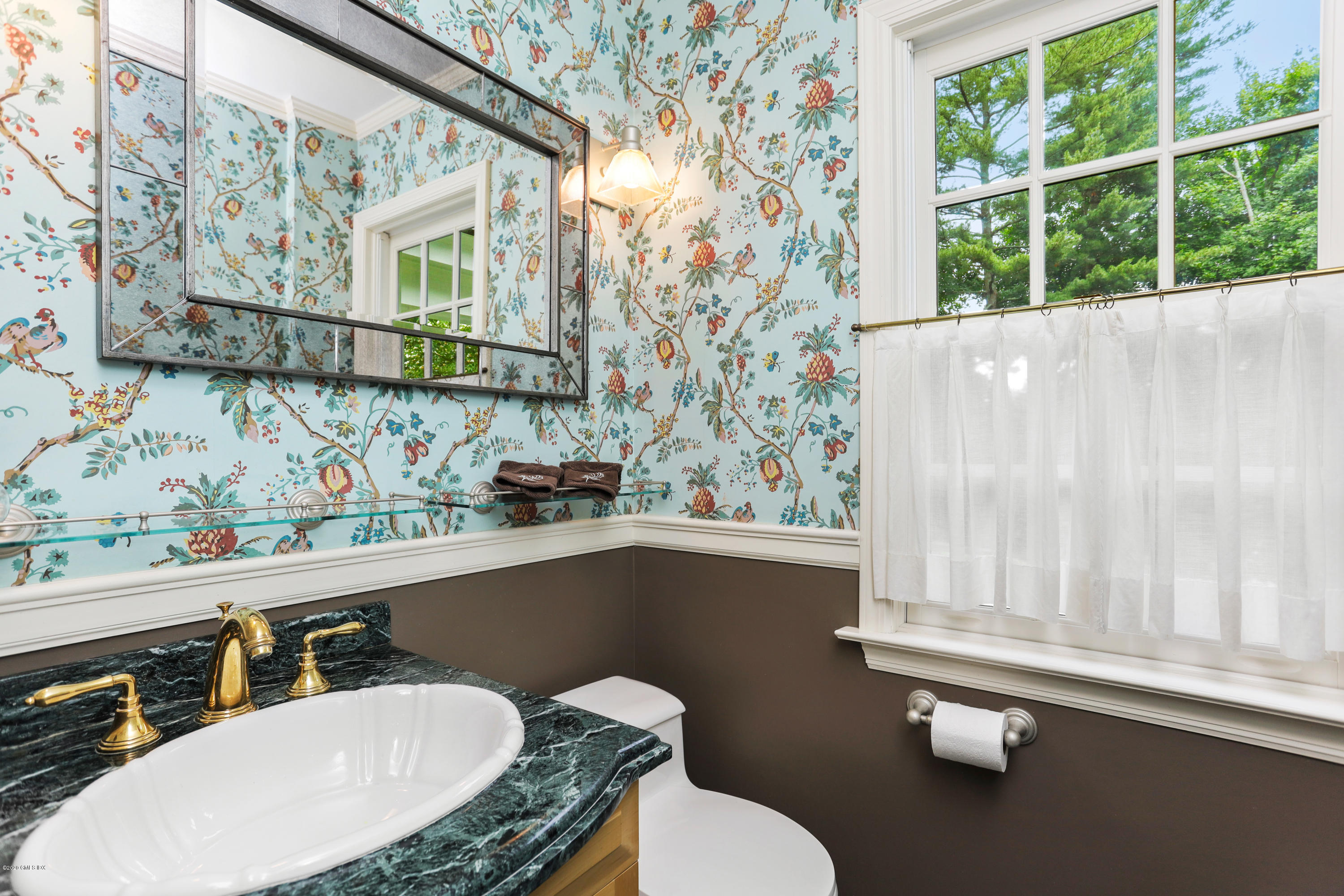 137 Clapboard Ridge Road Greenwich, CT 06831 - Photo 16 of 29 a bathroom with a sink and a mirror