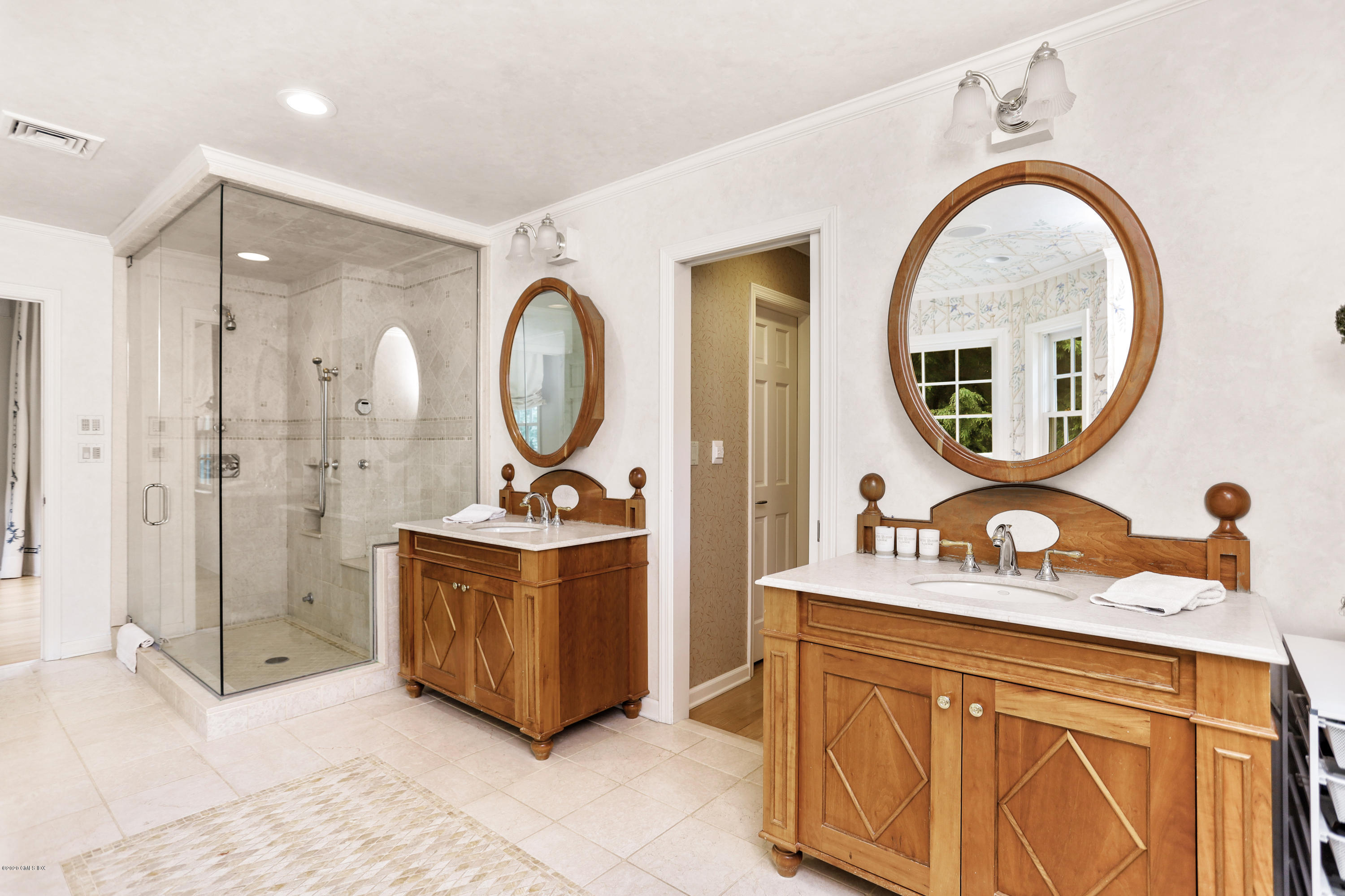 137 Clapboard Ridge Road Greenwich, CT 06831 - Photo 18 of 29 a spacious bathroom with a sink mirror and bathtub