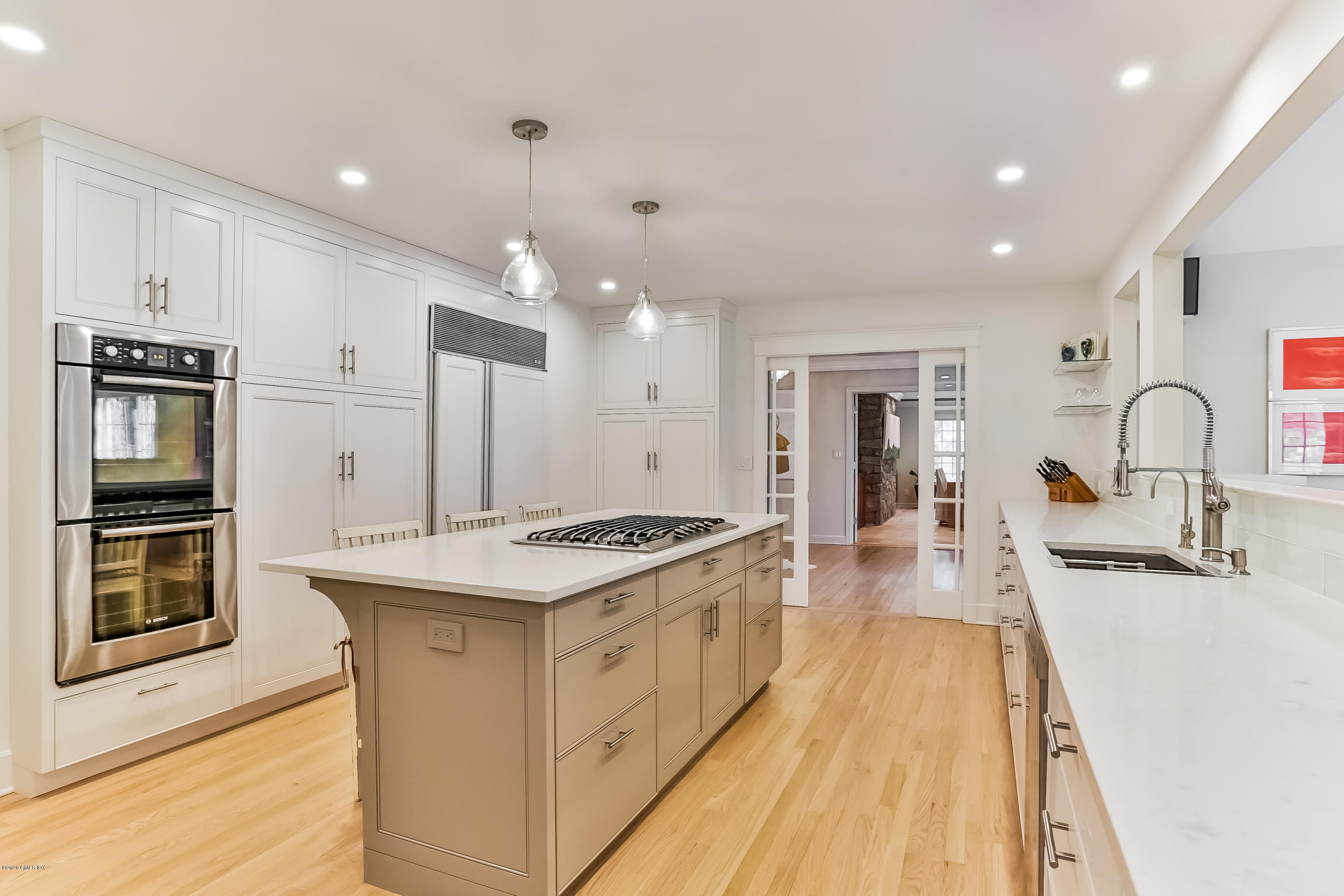 137 Clapboard Ridge Road Greenwich, CT 06831 - Photo 2 of 29 a large kitchen with stainless steel appliances granite countertop a stove and a sink