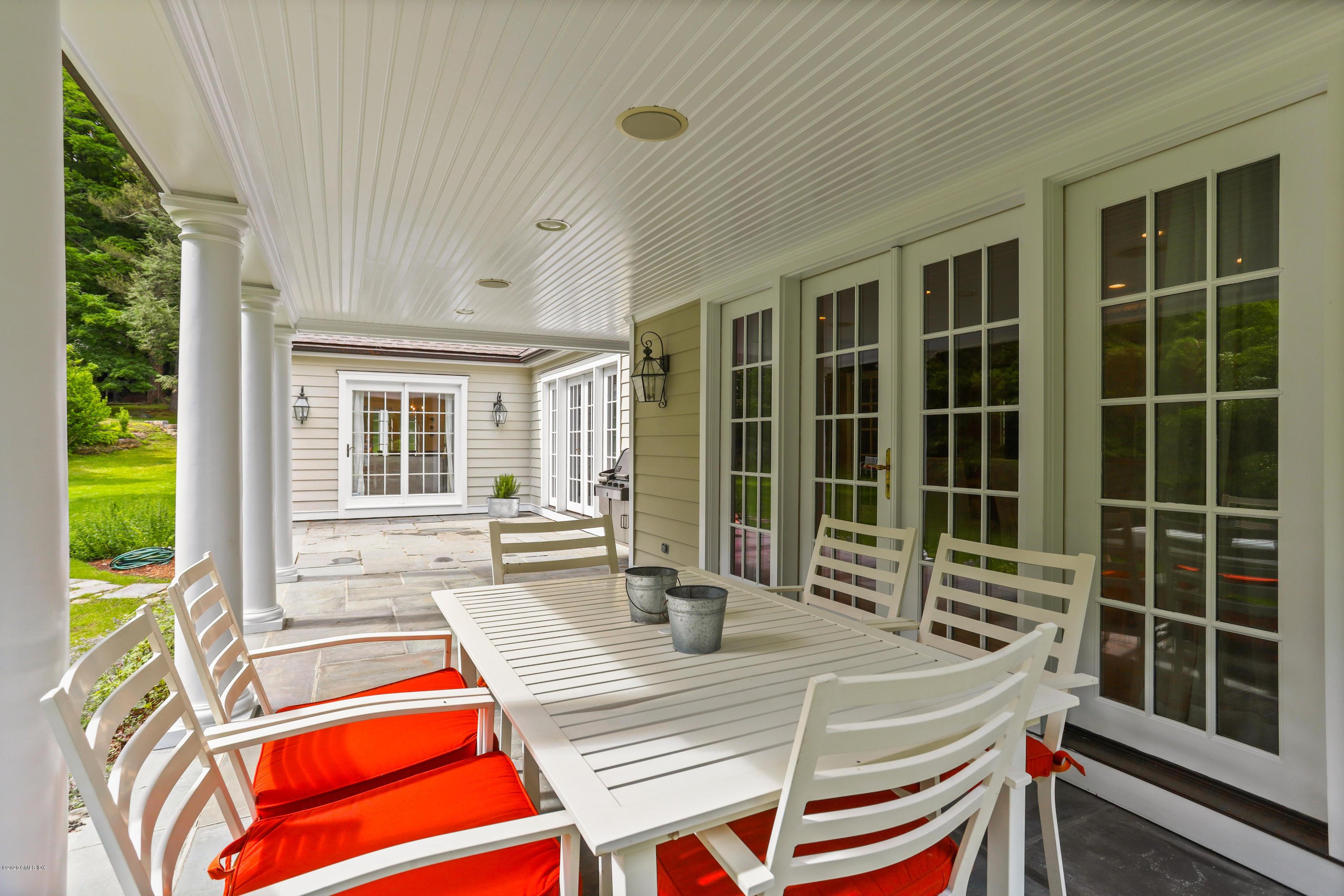 137 Clapboard Ridge Road Greenwich, CT 06831 - Photo 25 of 29 a room with gym equipment and a large window