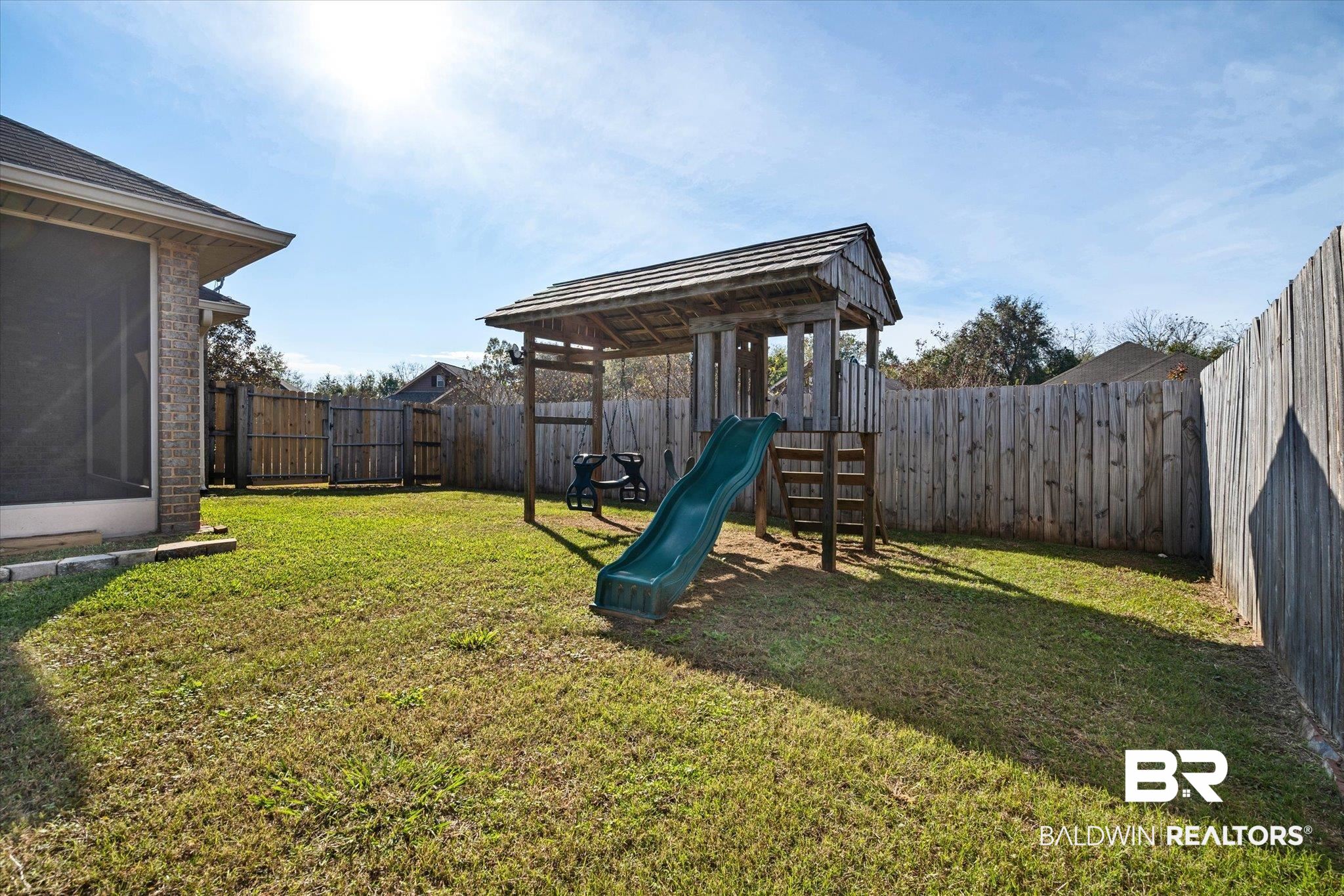 10251 Fionn Loop Daphne, AL 36526 - Photo 23 of 28 View of yard featuring a playground