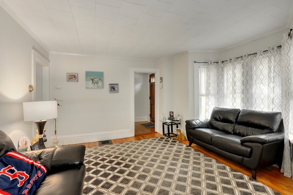 69 R Eastern Avenue Woburn, MA 01801 - Photo 26 of 35 a bedroom with furniture and a window