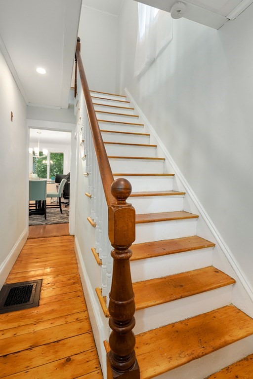 69 R Eastern Avenue Woburn, MA 01801 - Photo 27 of 35 a view of entryway and hall with wooden floor
