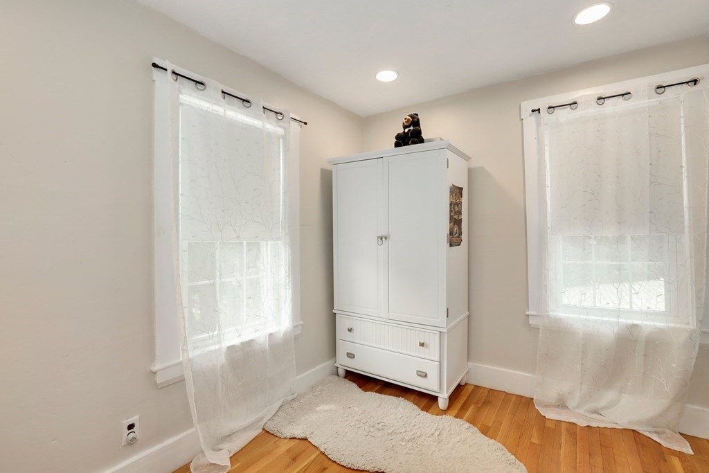 69 R Eastern Avenue Woburn, MA 01801 - Photo 10 of 35 a bathroom with a tub shower and sink