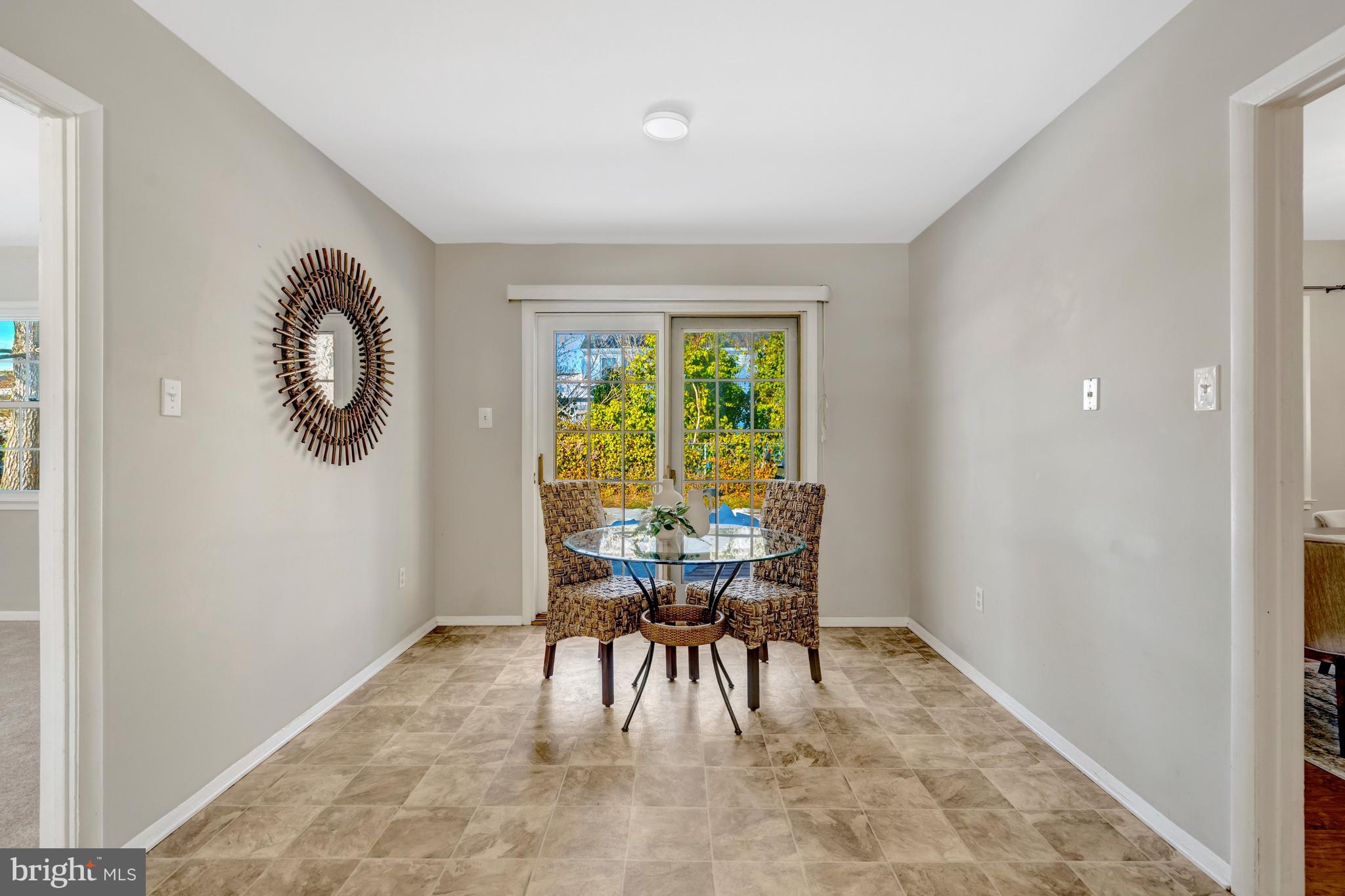 13128 Moss Ranch Lane Fairfax, VA 22033 - Photo 20 of 56 a dining room with furniture and a window