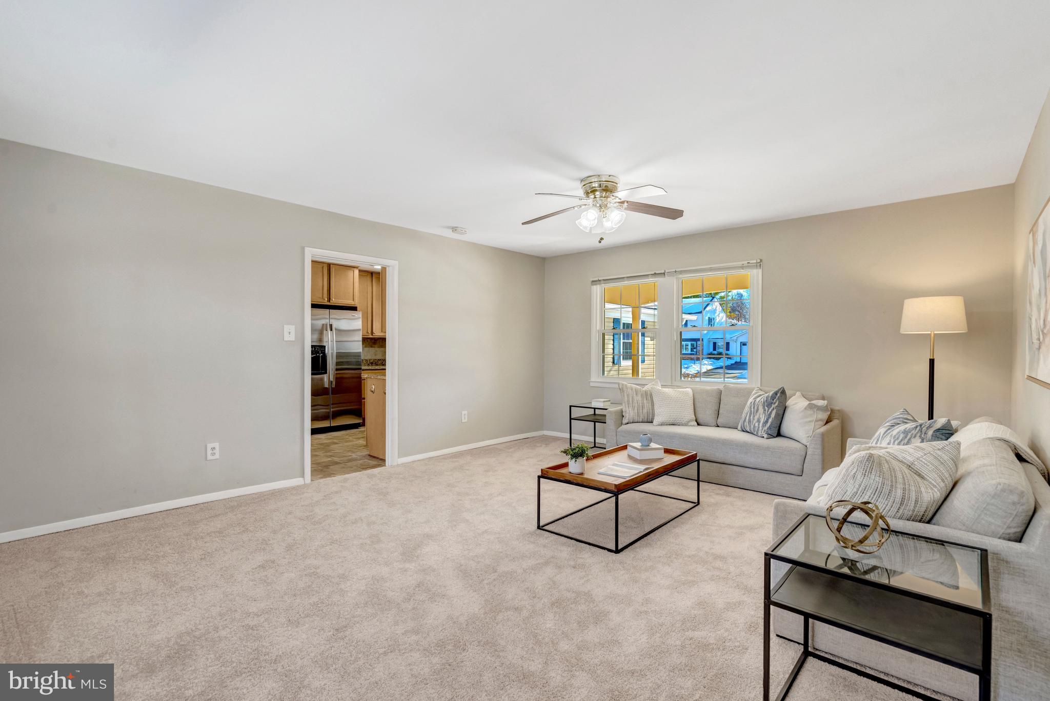 13128 Moss Ranch Lane Fairfax, VA 22033 - Photo 21 of 56 a living room with furniture and a window