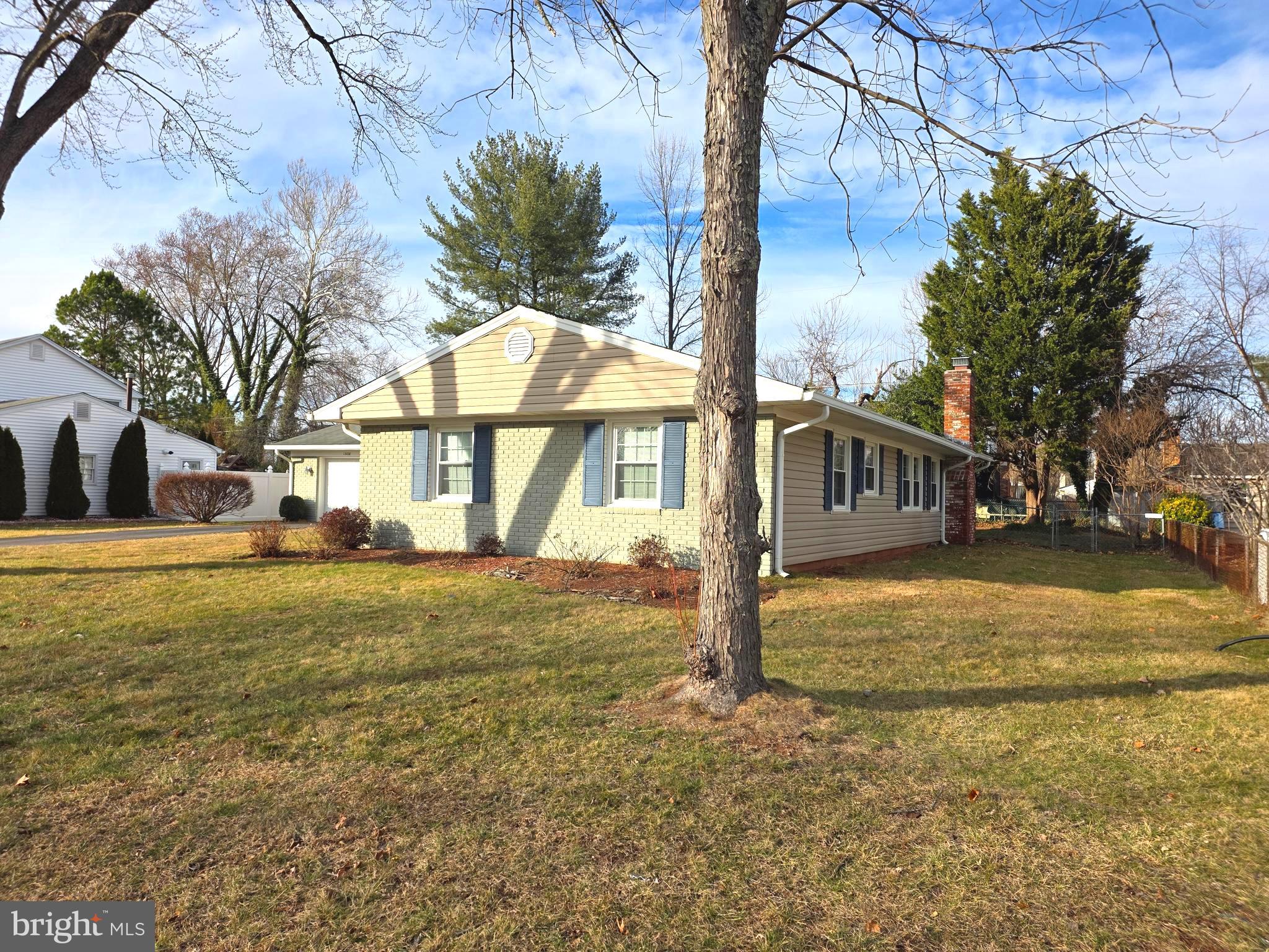 13128 Moss Ranch Lane Fairfax, VA 22033 - Photo 3 of 56 a view of a house with a yard