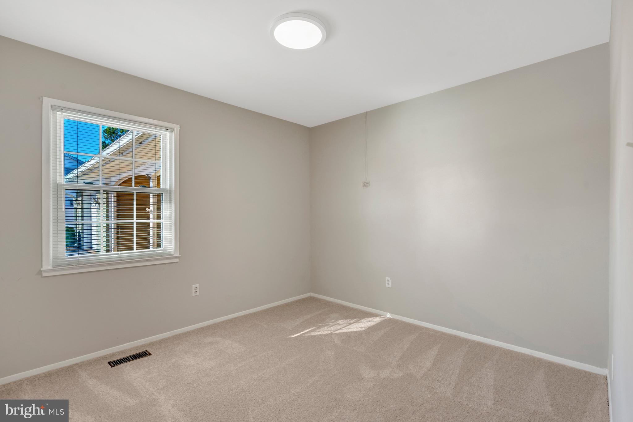 13128 Moss Ranch Lane Fairfax, VA 22033 - Photo 38 of 56 an empty room with a window