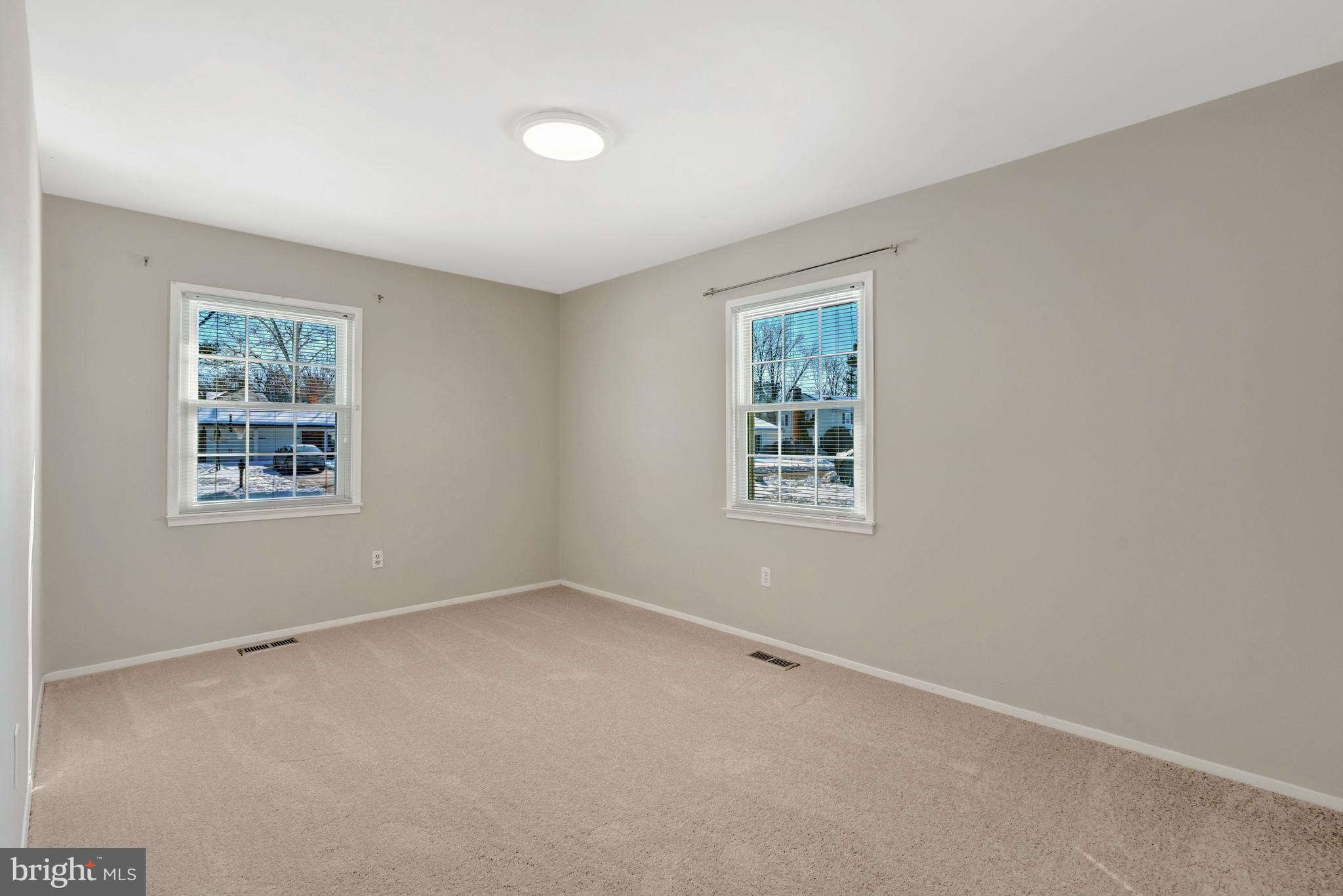 13128 Moss Ranch Lane Fairfax, VA 22033 - Photo 40 of 56 an empty room with windows