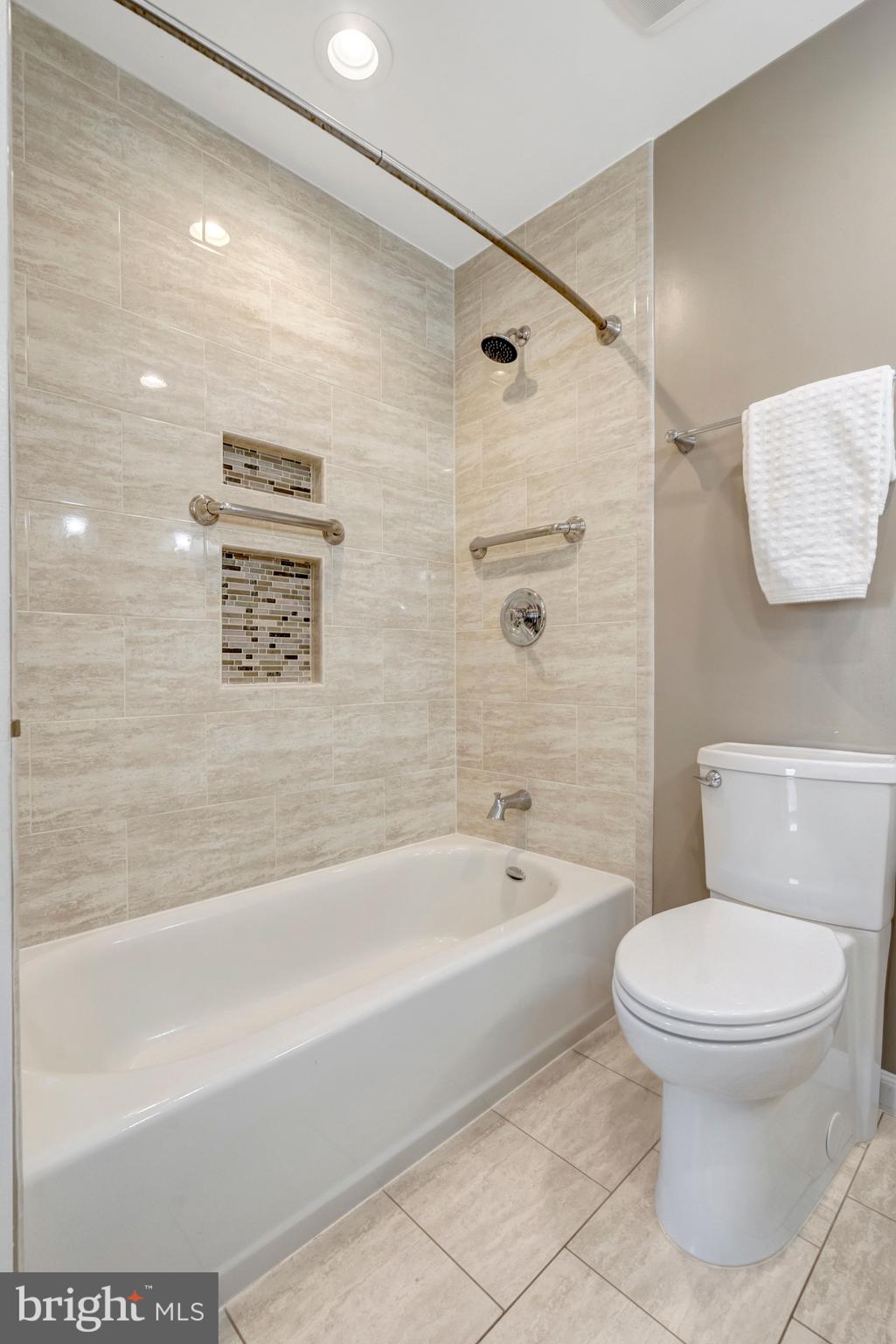 13128 Moss Ranch Lane Fairfax, VA 22033 - Photo 45 of 56 a bathroom with a toilet and a bathtub