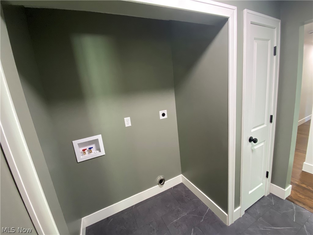 177 Paradise Road Painesville, OH 44077 - Photo 15 of 38 Main floor laundry area and pantry closet