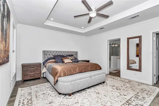 a view of a balcony with wooden floor and fence