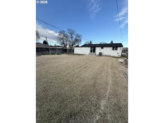 a view of a room with a floor to ceiling window