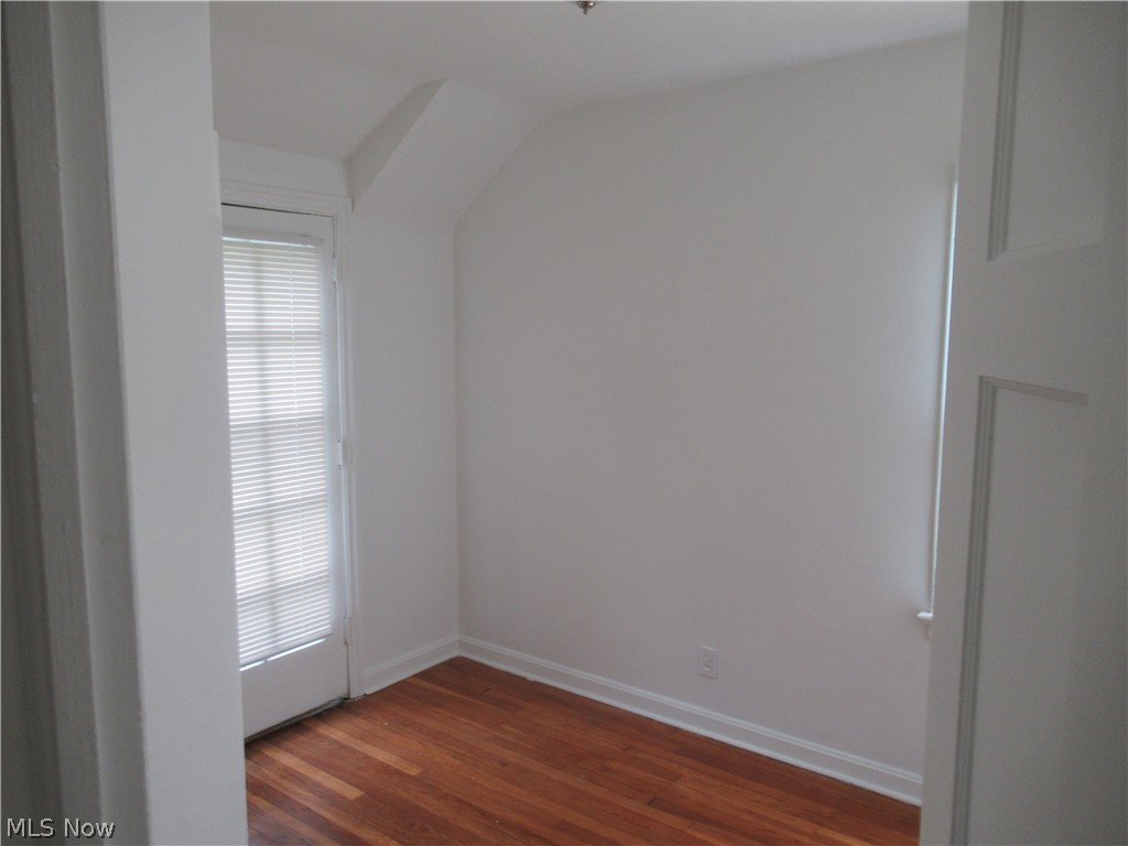 3824 East Antisdale Road Cleveland, OH 44118 - Photo 20 of 27 Hardwood flooring throughout, white baseboards, and a window with blinds