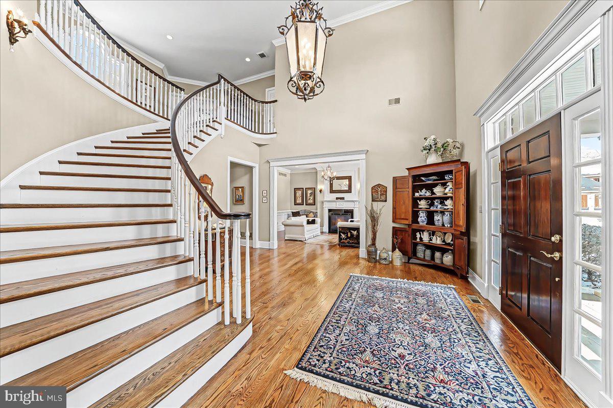 411 Webb Road Chadds Ford, PA 19317 - Photo 11 of 73 Curved staircase in two-story foyer