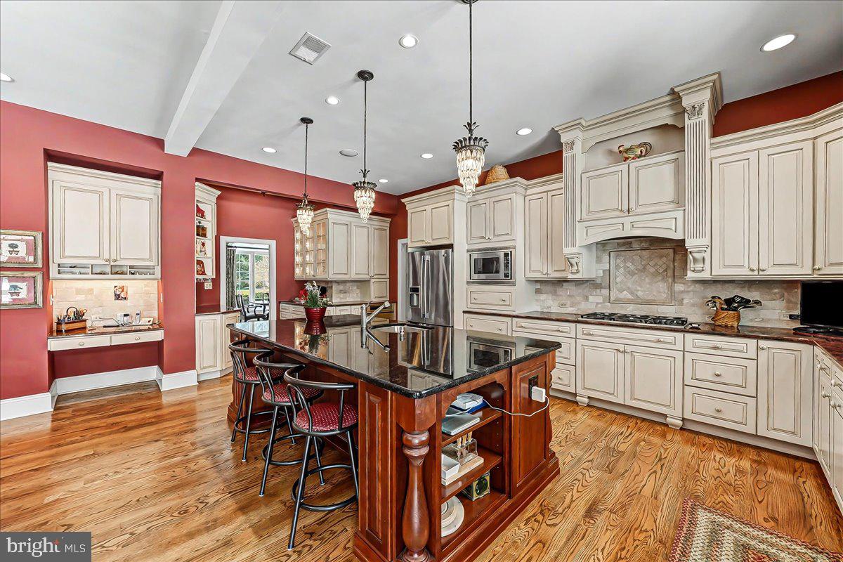 411 Webb Road Chadds Ford, PA 19317 - Photo 18 of 73 Beautiful cabinetry and desk area in the kitchen