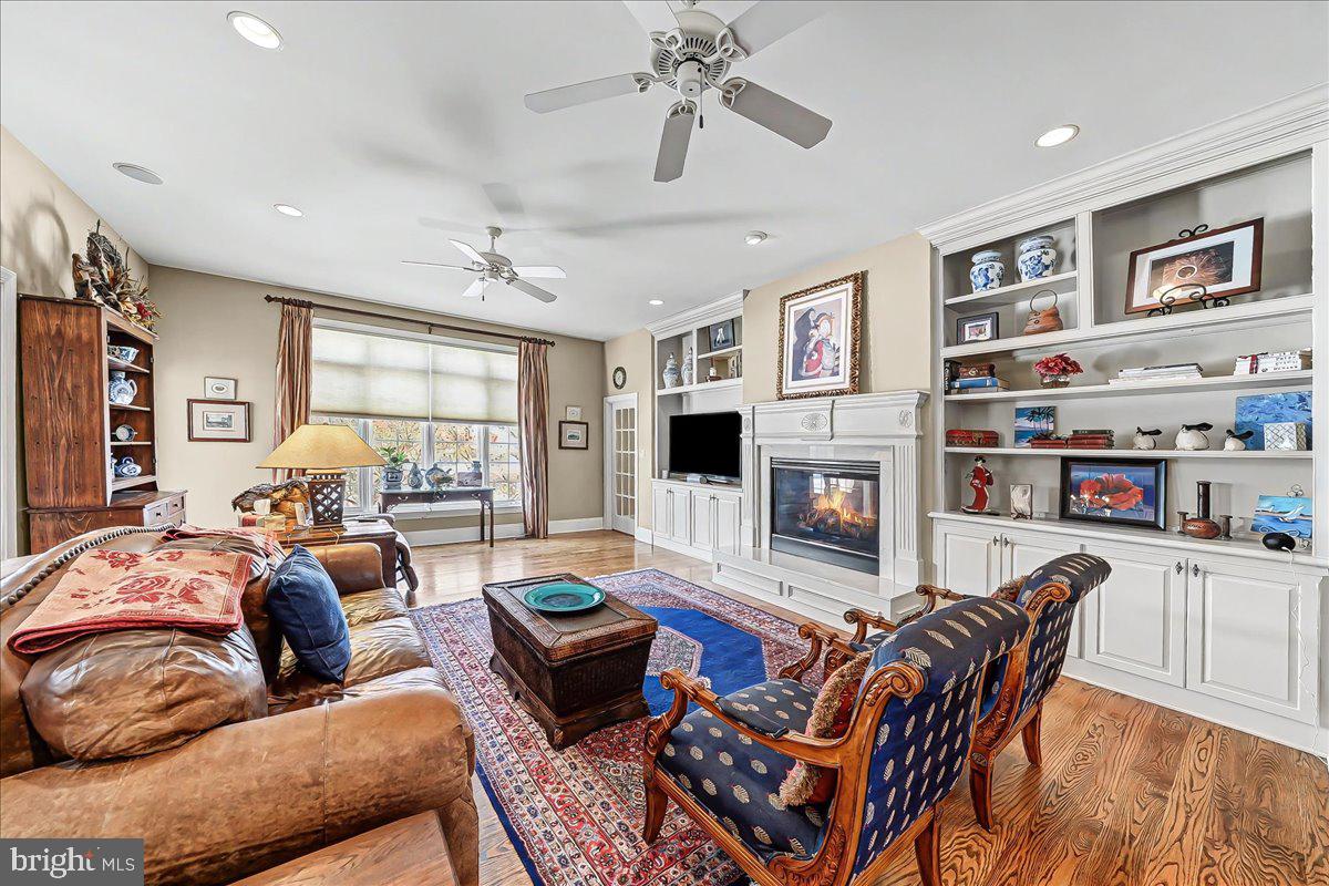 411 Webb Road Chadds Ford, PA 19317 - Photo 25 of 73 Family room with built-ins and gas fireplace