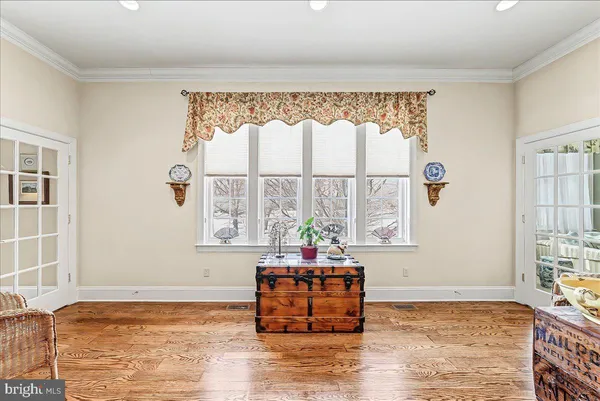 a bedroom with a bed and a fireplace