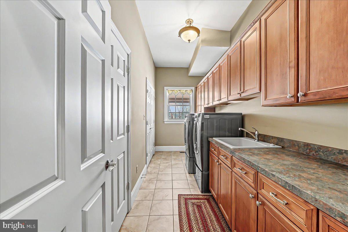 411 Webb Road Chadds Ford, PA 19317 - Photo 31 of 73 Main floor laundry and informal half bath