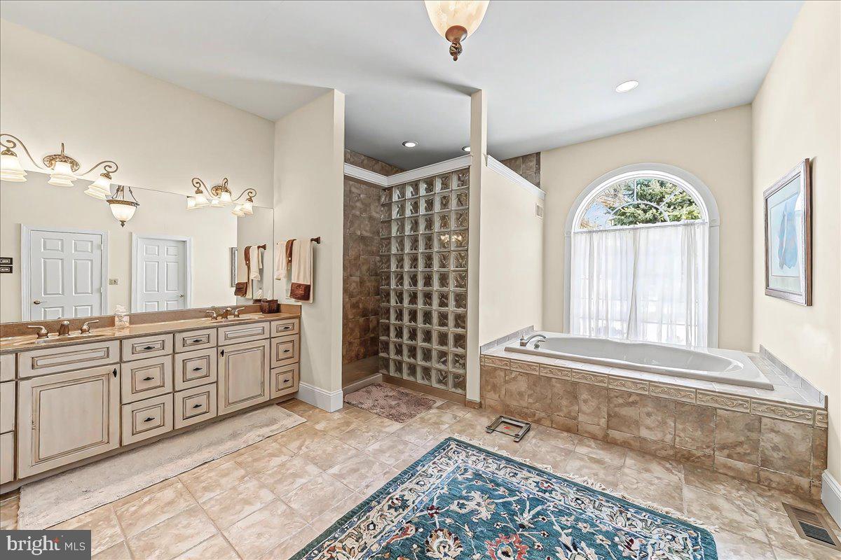 411 Webb Road Chadds Ford, PA 19317 - Photo 40 of 73 Primary bath with large tub and shower stall