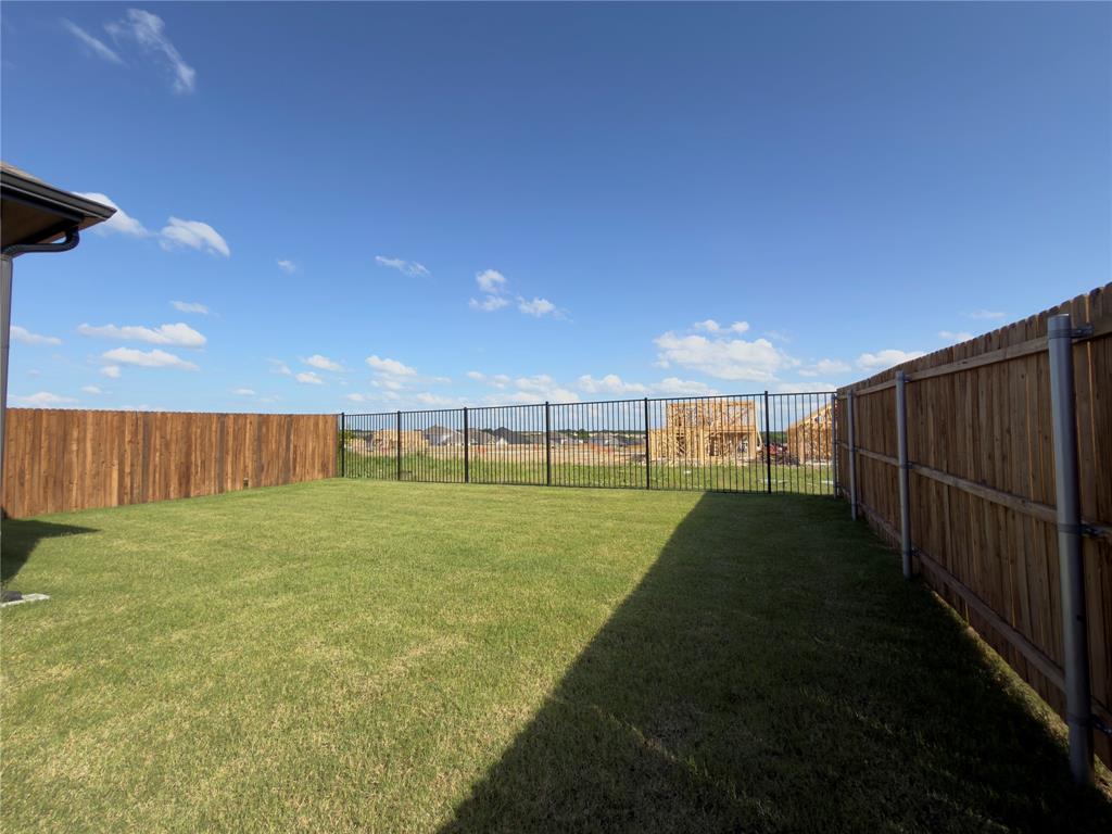 120 Millwood Road Lavon, TX 75166 - Photo 34 of 34 Expansive backyard featuring a large grass lawn