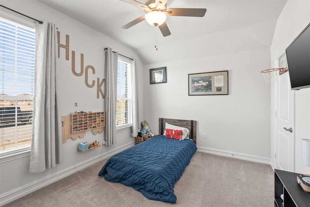 2920 Arlo Road Aubrey, TX 76227 - Photo 14 of 31 a living room with furniture and a window