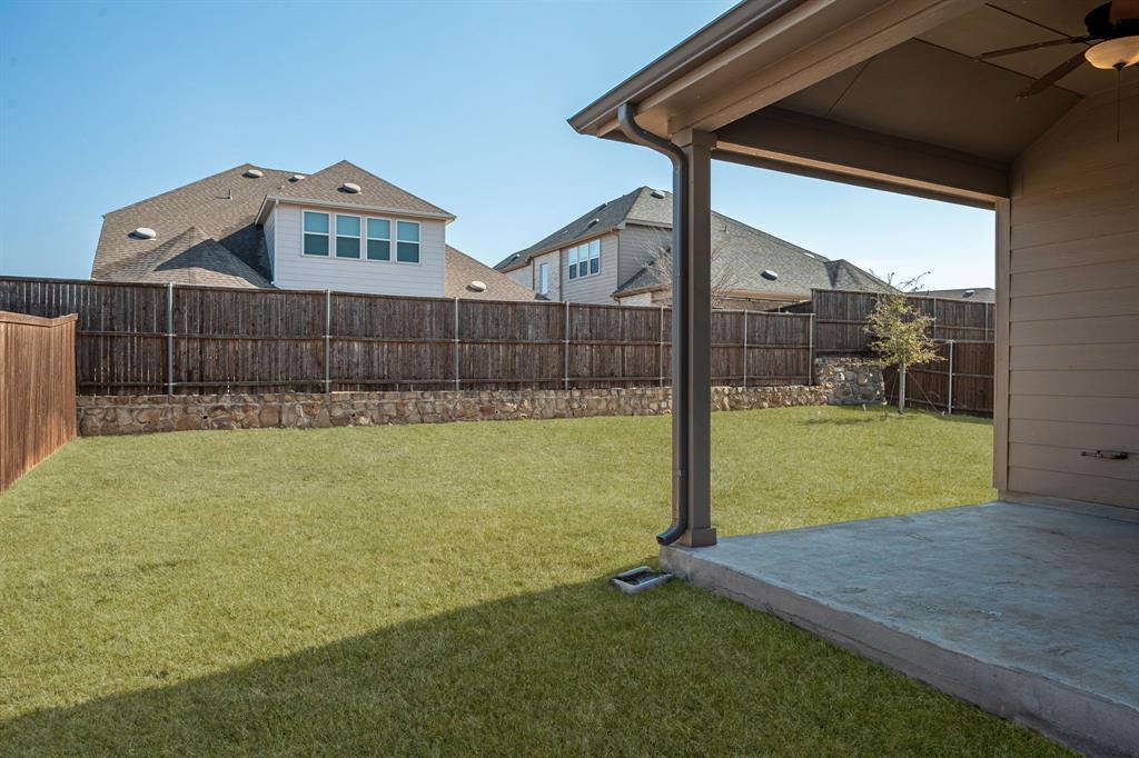 2920 Arlo Road Aubrey, TX 76227 - Photo 24 of 31 a view of a backyard