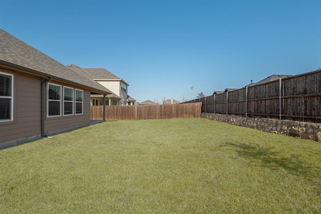 2920 Arlo Road Aubrey, TX 76227 - Photo 26 of 31 a view of a backyard