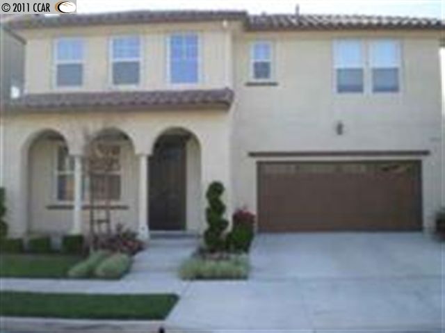 2216 Mornington Lane San Ramon, CA 94582 - Photo 1 of 1 a front view of a house with garden