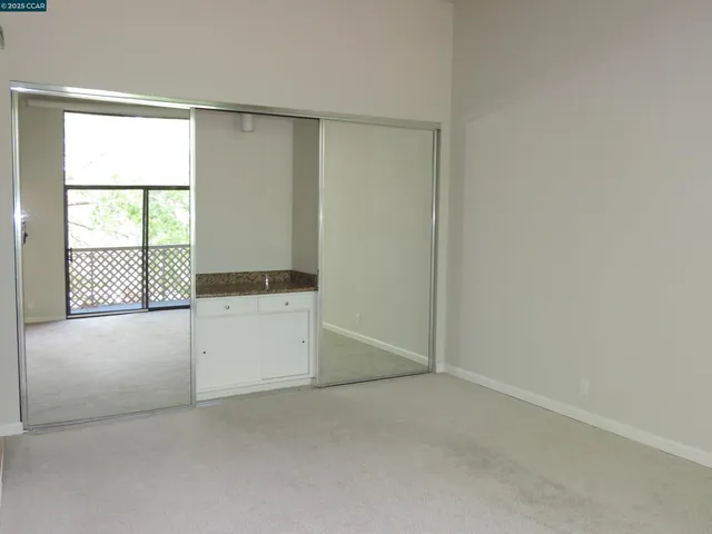 a bathroom with a double vanity sink and mirror