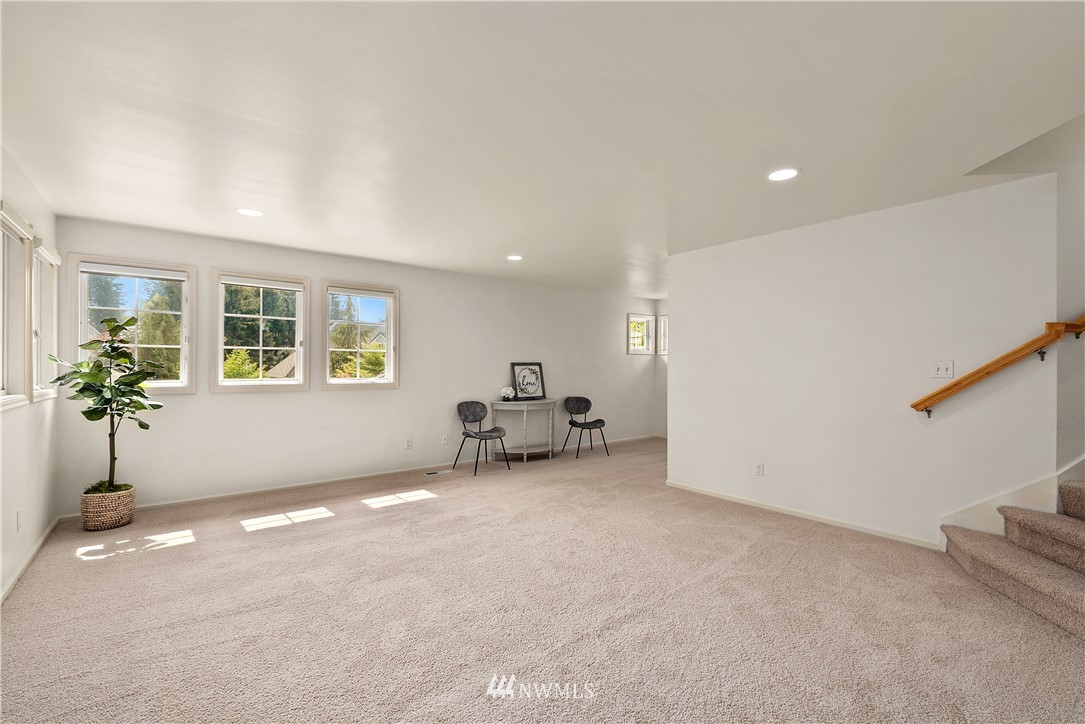 4729 176th Street Southeast Bothell, WA 98012 - Photo 17 of 40 a view of livingroom with furniture and a window