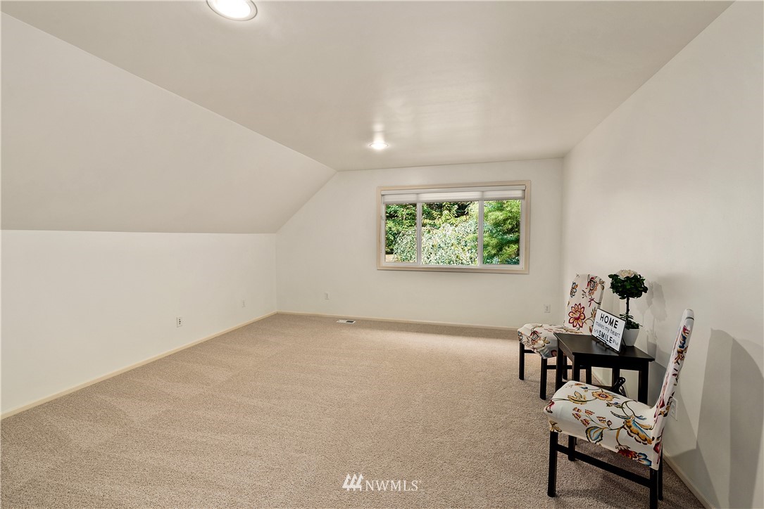 4729 176th Street Southeast Bothell, WA 98012 - Photo 21 of 40 a room with furniture and window