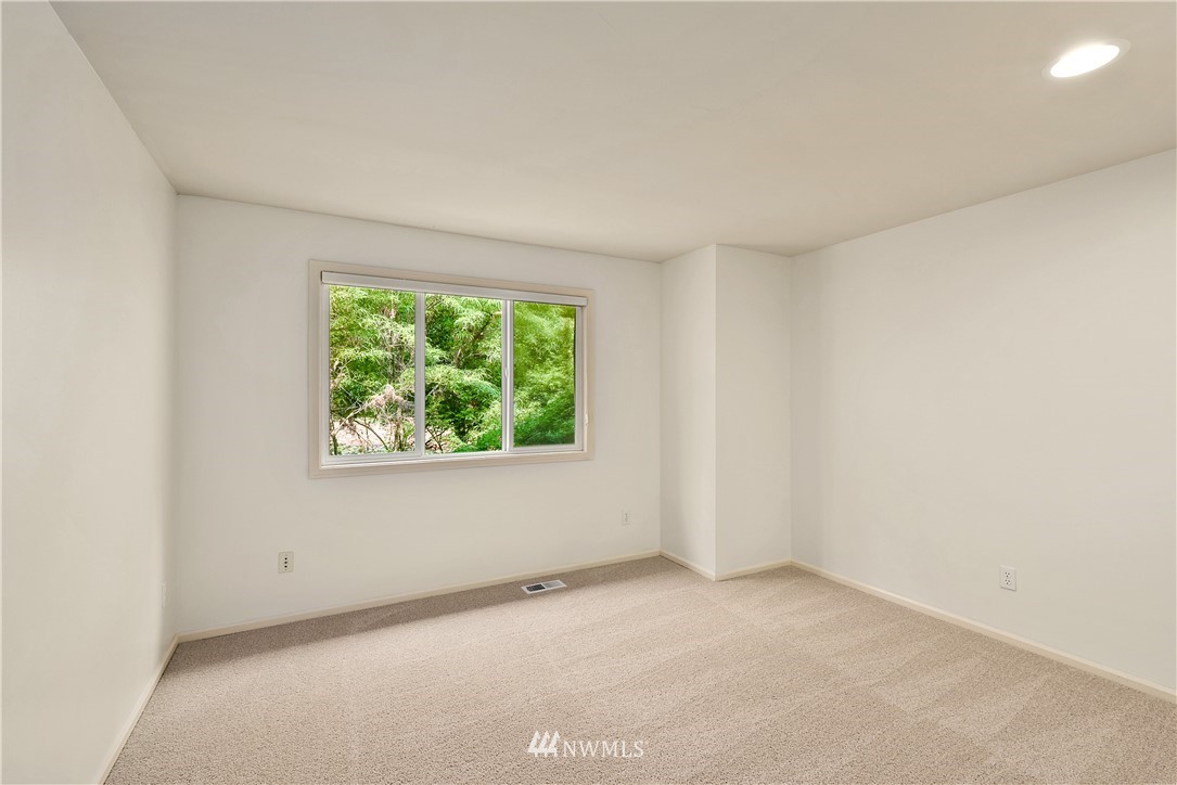 4729 176th Street Southeast Bothell, WA 98012 - Photo 22 of 40 an empty room with a window