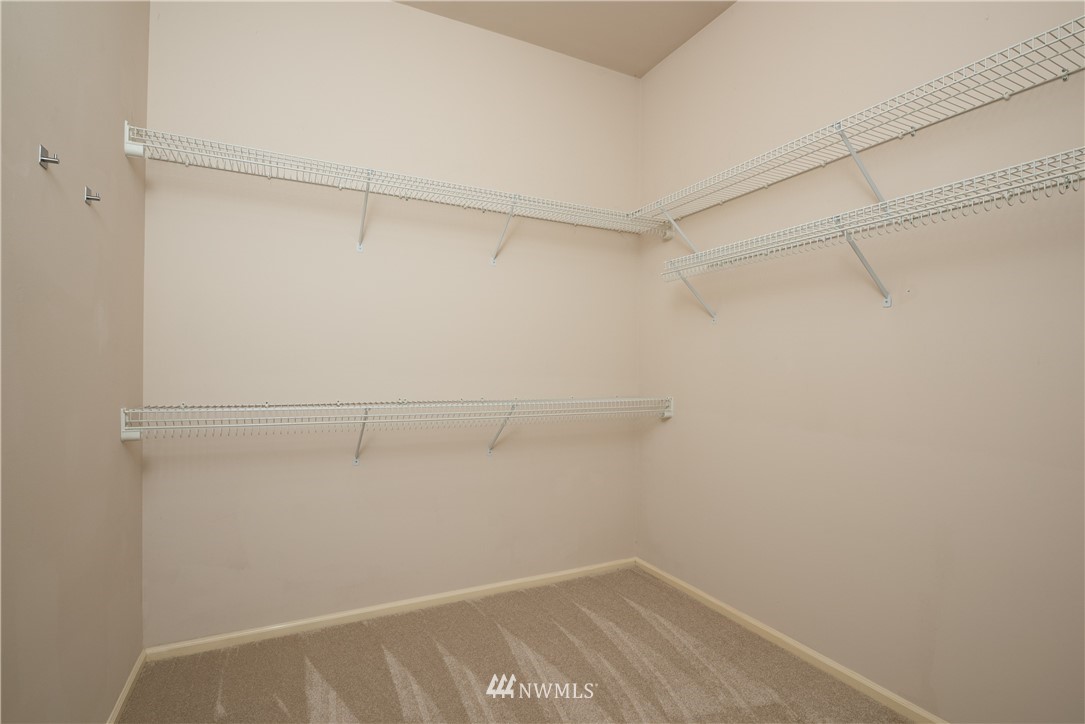 4729 176th Street Southeast Bothell, WA 98012 - Photo 31 of 40 a view of a room with racks on the wall